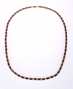 Gold necklace with garnets
