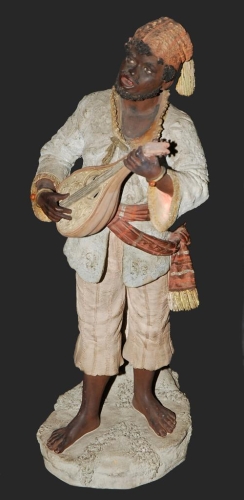 Figura terakota "Czarnoskóry grajek", Wiedeń, ok. 1900 r., antyki, Galeria Żak, stara porcelana, porcelana, antyki Warszawa, figurka porcelanowa